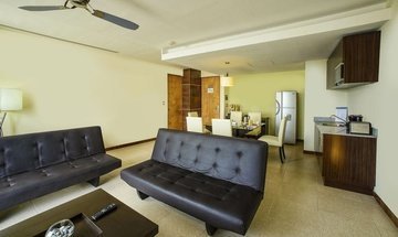 Sala quarto Hotel Krystal Urban Cancún - 